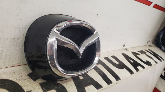 Эмблема решетки радиатора Mazda 6 GJ 2018-2024