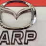 Эмблема крышки багажника Mazda 3 BL 2009-2013