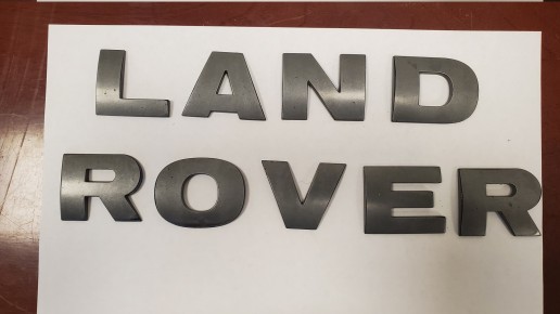 Эмблема на капот буквы Land Rover Discovery 3 2009-2016