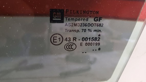 Стекло задней левой двери Opel Astra H 2004-2014